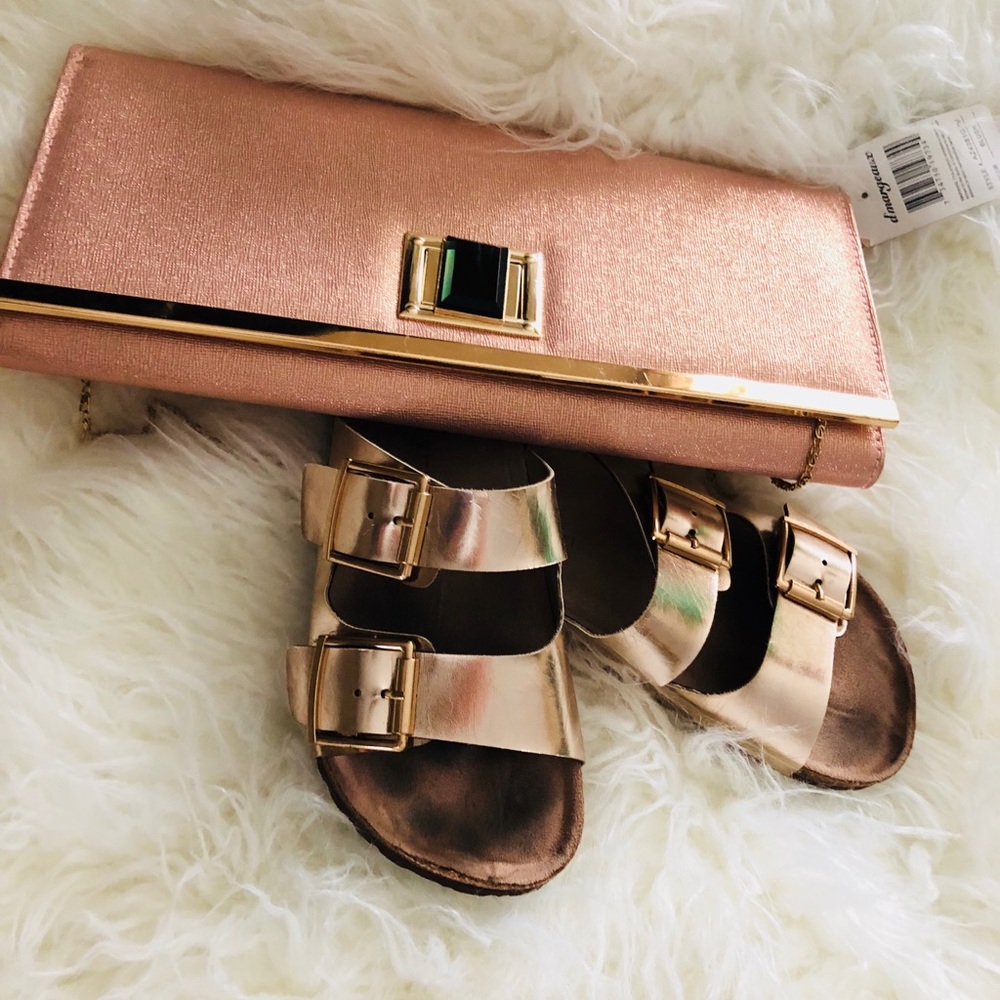 Pink clutch purse with gold linked strap